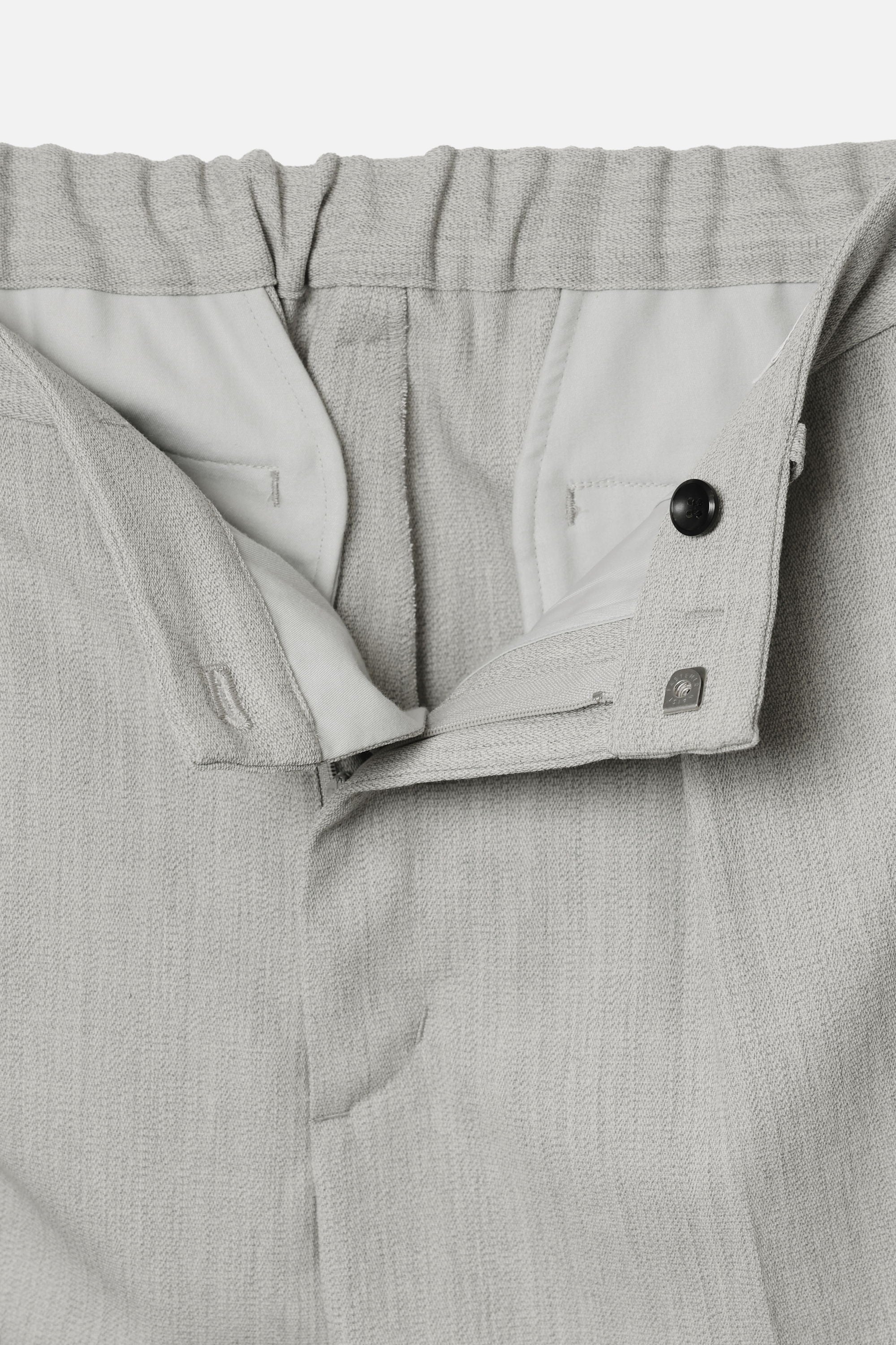 ハイツイストウールギャバジンキャンバス 1タックストレートパンツ