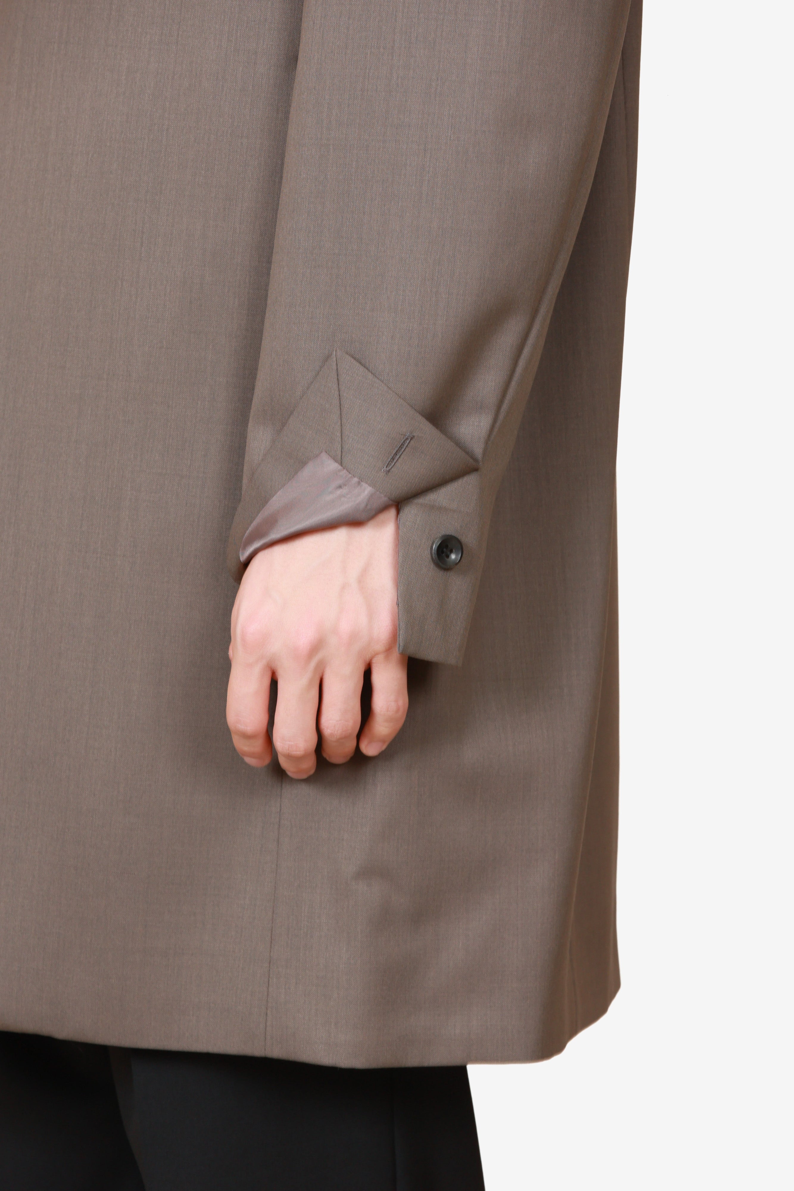 限定商品 AC52-120 ウール/ポリエステルストレッチギャバジン ノーカラーロングジャケット